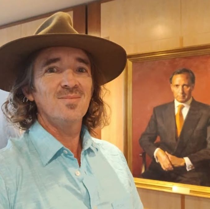 Brett Murrell beside Paul Keating&rsquo;s prime ministerial portrait in Parliament House.